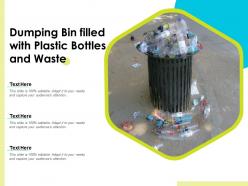 Dumping bin filled with plastic bottles and waste