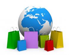 Earth and shopping bags with globe stock photo