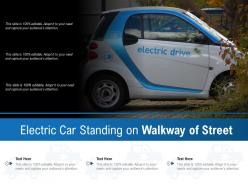 Electric car standing on walkway of street