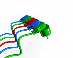 Electrical Plugs With Green Blue And Red Color Showing Team Unity Stock Photo
