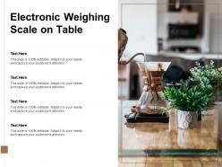 Electronic weighing scale on table