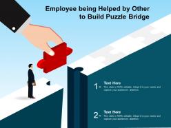 Employee being helped by other to build puzzle bridge
