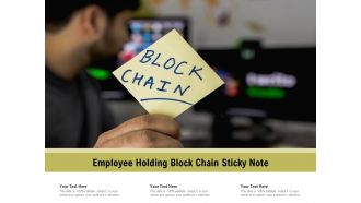 Employee holding block chain sticky note