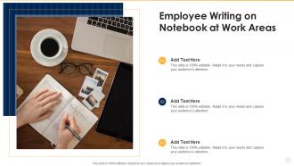 Employee writing on notebook at work areas