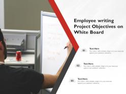 Employee writing project objectives on white board
