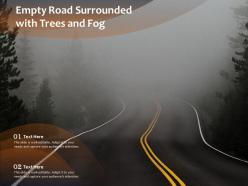 Empty road surrounded with trees and fog