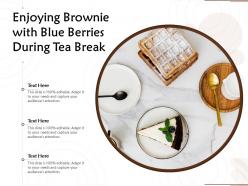 Enjoying brownie with blue berries during tea break