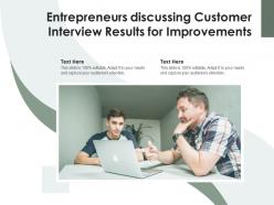 Entrepreneurs discussing customer interview results for improvements