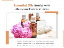 Essential oils bottles with medicinal flowers herbs