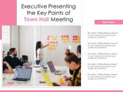 Executive presenting the key points of town hall meeting