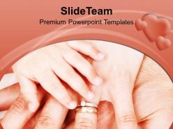 Father mother and baby holding hands family powerpoint templates ppt themes and graphics 0313
