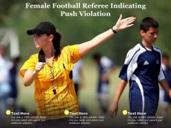 Female football referee indicating push violation