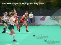 Female players playing hockey match