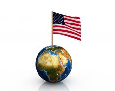 Flag of america fixed over the globe stock photo