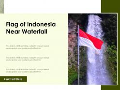 Flag of indonesia near waterfall
