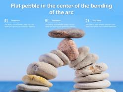 Flat pebble in the center of the bending of the arc