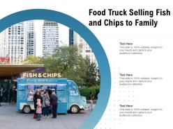 Food truck selling fish and chips to family