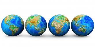 Four earth globes stock photo