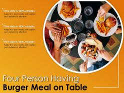 Four person having burger meal on table