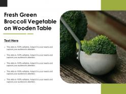 Fresh green broccoli vegetable on wooden table