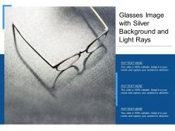 Glasses image with silver background and light rays