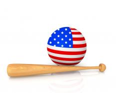 Globe designed with flag of america and baseball bat stock photo