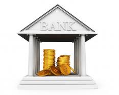 Gold coins in bank safe related to finance stock photo
