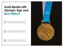Gold medal with olympic sign and blue ribbon