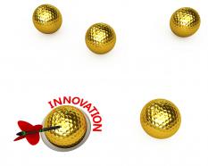 Golden balls with arrow hitting target of innovation stock photo