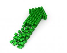 Green arrow designed with multiple cubes stock photo