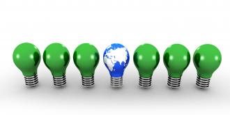 Green bulbs with one globe head bulb showing leadership stock photo