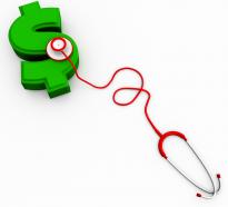 Green dollar with stethoscope with white background stock photo
