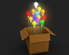 Group of multi color light bulb in carton box stock photo