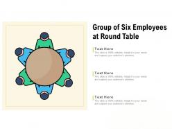 Group of six employees at round table