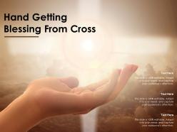 Hand getting blessing from cross