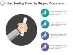 Hand Holding Shown By Gripping Documents Diploma Or Certificate