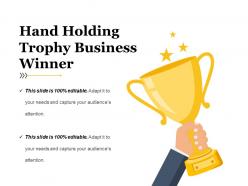 Hand holding trophy business winner ppt example professional