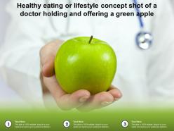Healthy eating or lifestyle concept shot of a doctor holding and offering a green apple