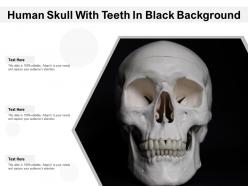 Human skull with teeth in black background