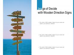 Image of decide with wooden direction signs