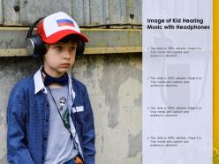 Image of kid hearing music with headphones