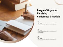 Image Of Organizer Finalizing Conference Schedule