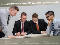 Image Of Organizers Discussing CSR Conference Agenda And Schedule