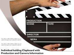 Individual holding clapboard with production and camera information