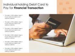 Individual holding debit card to pay for financial