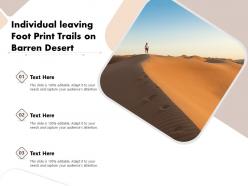 Individual leaving foot print trails on barren desert