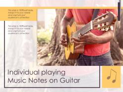 Individual playing music notes on guitar