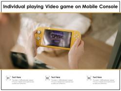 Individual playing video game on mobile console