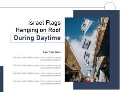 Israel flags hanging on roof during daytime