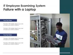 It employee examining system failure with a laptop
